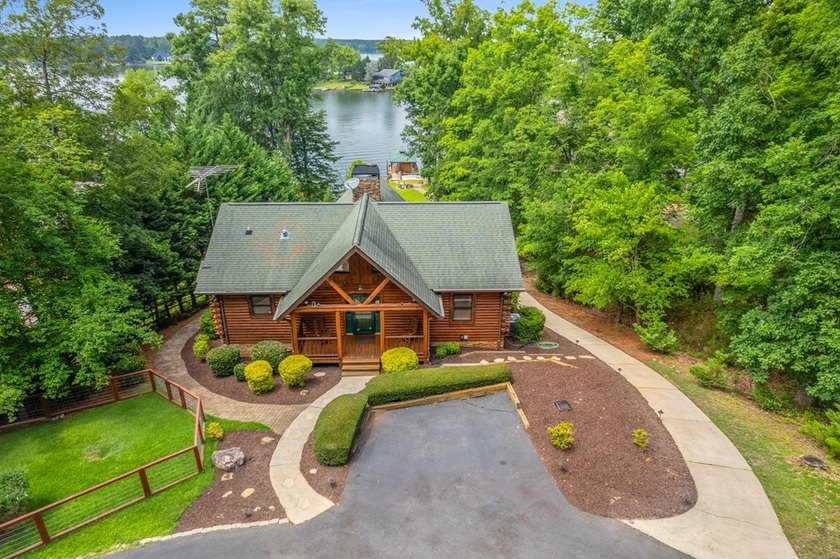 Don't miss this stunning lakefront log cabin on beautiful Lake - photo 2