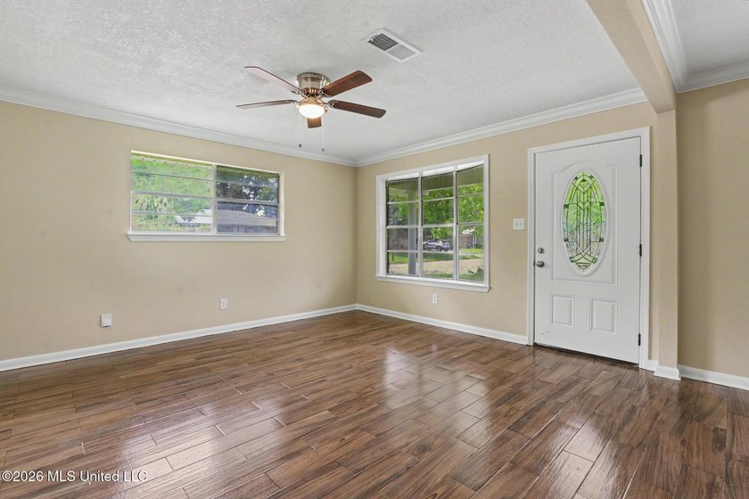 Welcome to this charming 3-bedroom, 2-bath home offering - photo 3