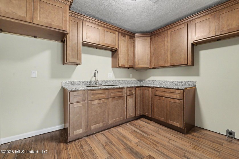 Welcome to this charming 3-bedroom, 2-bath home offering - photo 8