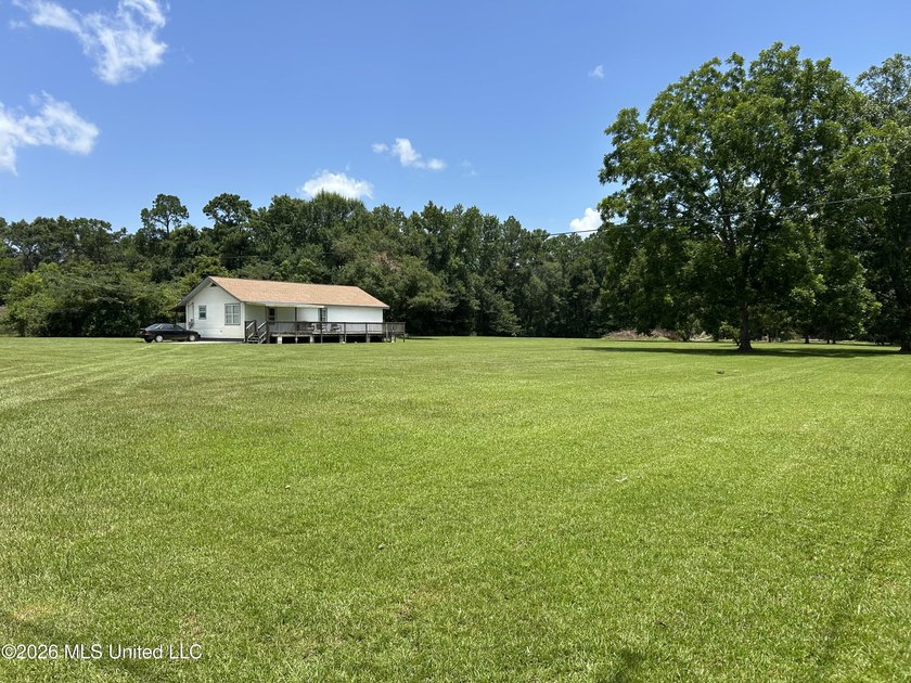 PRIME LOCATION WITH ACREAGE! Are you wanting to stay close to - photo 2