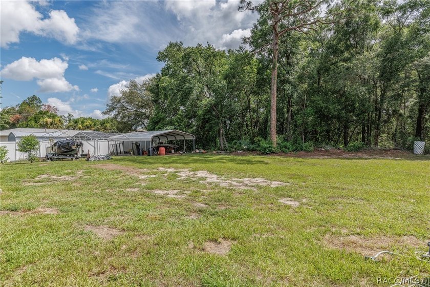 NICE 3/2/2 CONCRETE BLOCK HOME ON .47 ACRE MOL DOUBLE LOT - photo 29