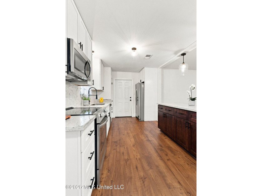 Welcome to this beautifully remodeled home, in a quiet - photo 8