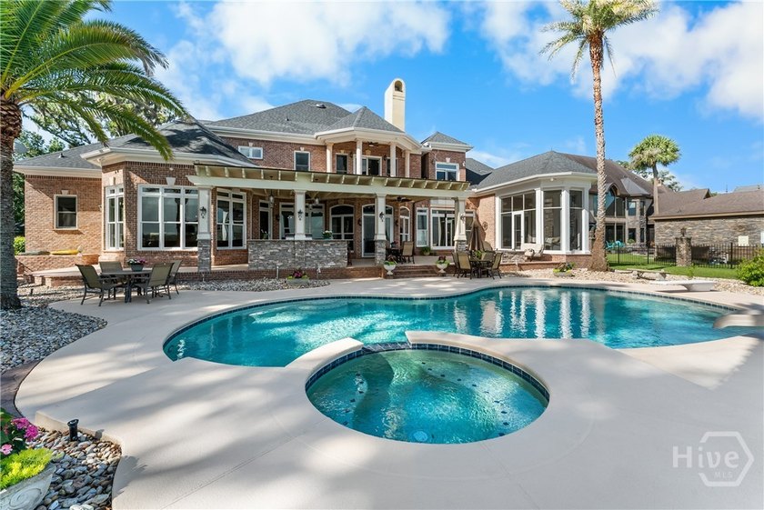 Welcome to an extraordinary riverfront estate where timeless - photo 5