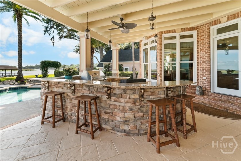 Welcome to an extraordinary riverfront estate where timeless - photo 6