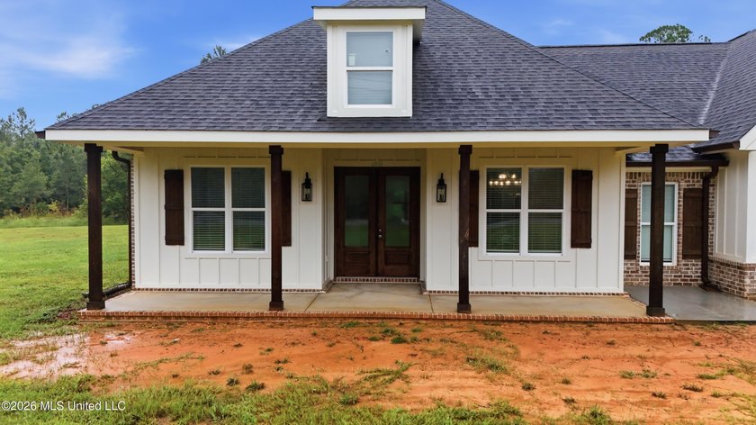 Nearly Brand New on 7.9 Acres! Completed in late 2024, this - photo 3