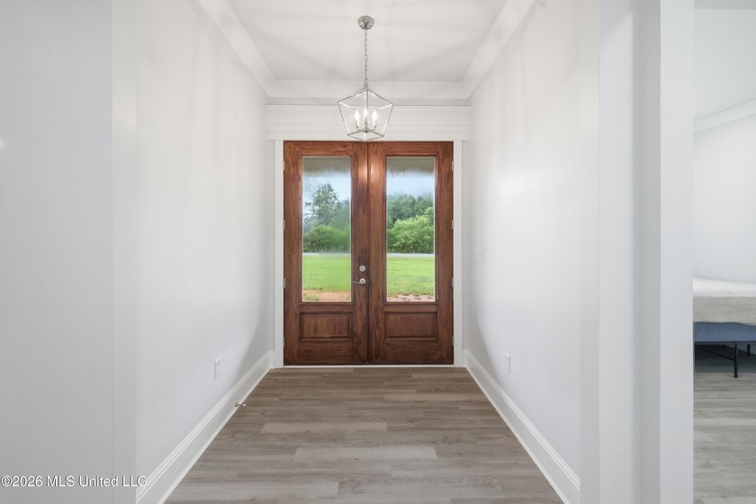 Nearly Brand New on 7.9 Acres! Completed in late 2024, this - photo 5