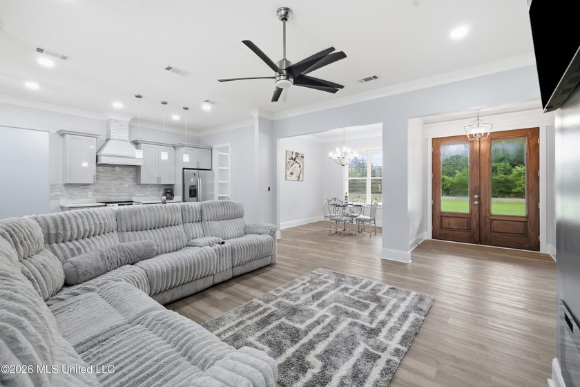 Nearly Brand New on 7.9 Acres! Completed in late 2024, this - photo 7
