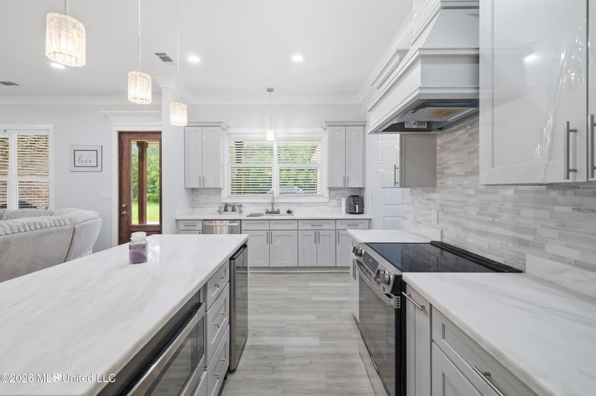 Nearly Brand New on 7.9 Acres! Completed in late 2024, this - photo 10