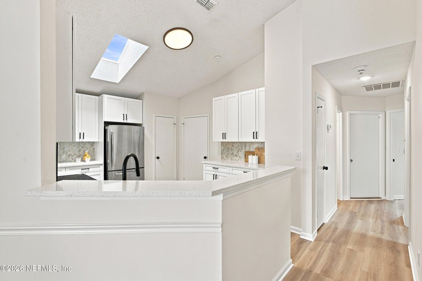 RARE LAKEFRONT OPPORTUNITY! Wake up to breathtaking water views - photo 12