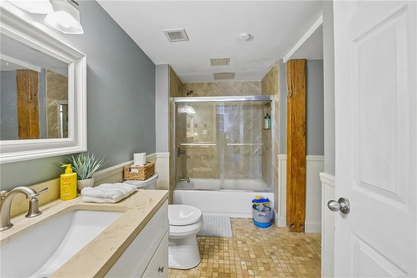 Enjoy waterfront living in the heart of East Greenwich with - photo 15