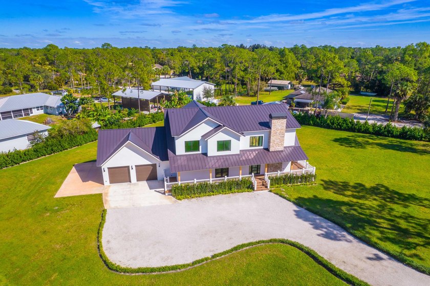This exceptional new construction estate offers a refined blend - photo 2