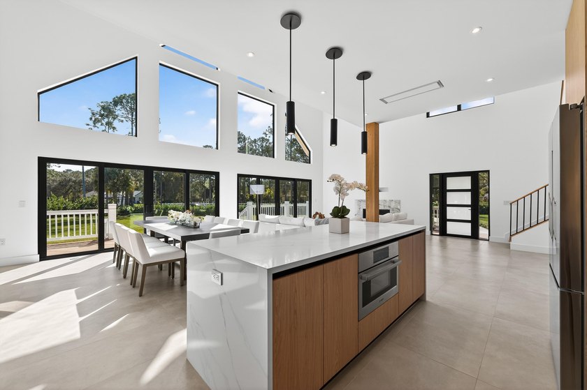 This exceptional new construction estate offers a refined blend - photo 5