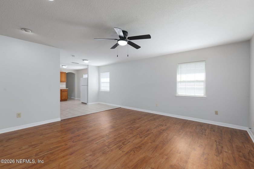 This charming cottage-style home with 3 beds + 2 baths is - photo 4