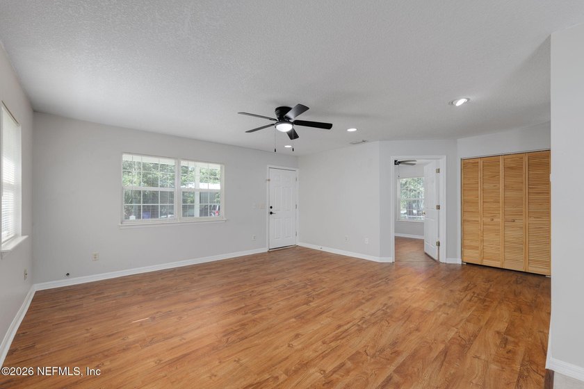 This charming cottage-style home with 3 beds + 2 baths is - photo 7