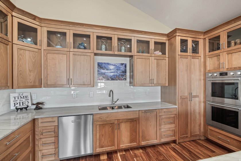 Custom-built waterfront luxury resort home, located in a private - photo 9