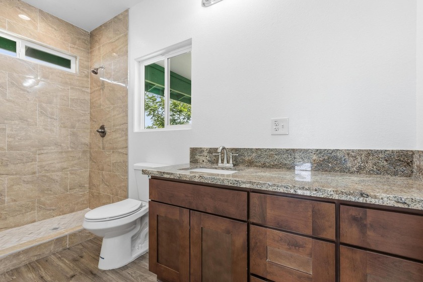 Brand-new 3 bedroom, 2 bathroom home with covered carport and - photo 22
