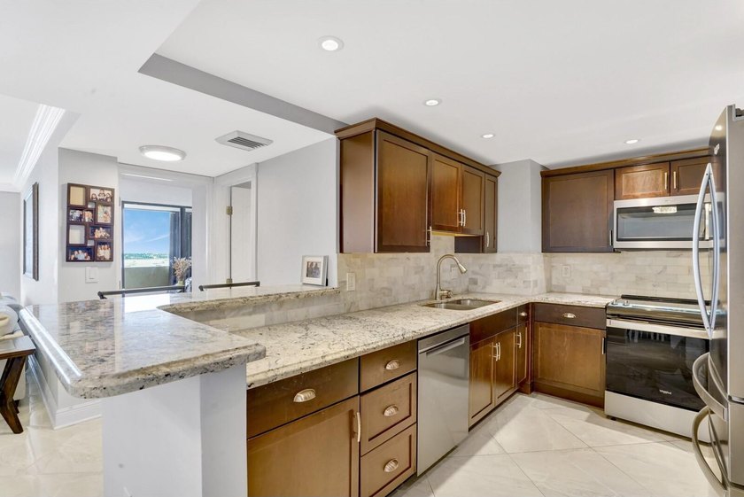 SPECTACULAR views from this amazing unit in a community that - photo 4