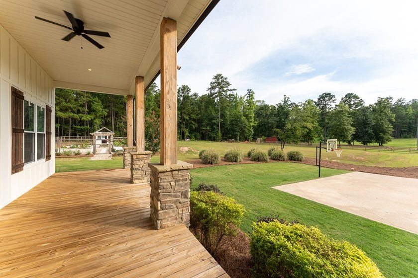 Nestled on 7 breathtaking acres in Putnam County, this - photo 4