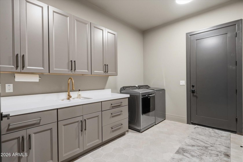 Completed in 2025, this custom home in Desert Ranch offers - photo 31