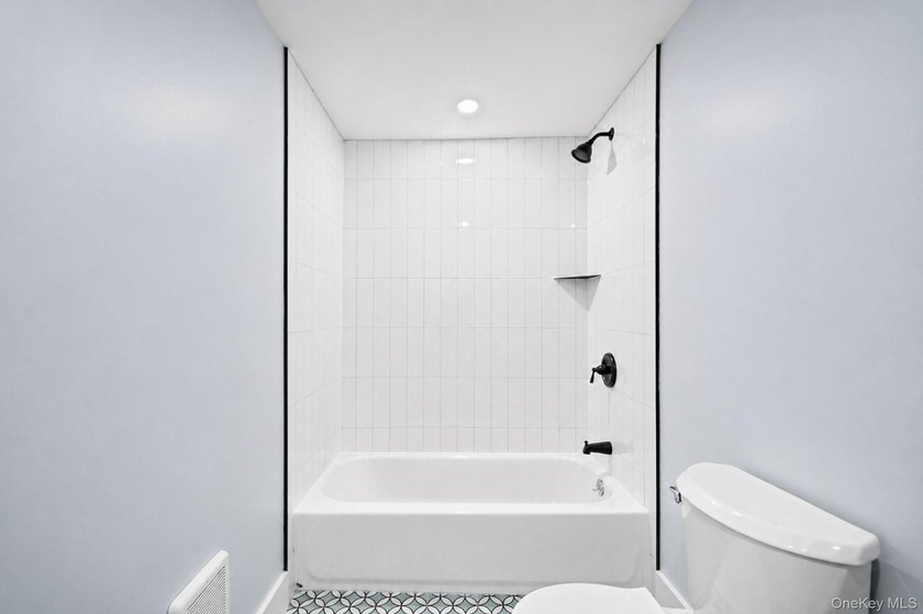 Turnkey Renovated Farmhouse-Style Cape - Elwood School District - photo 17