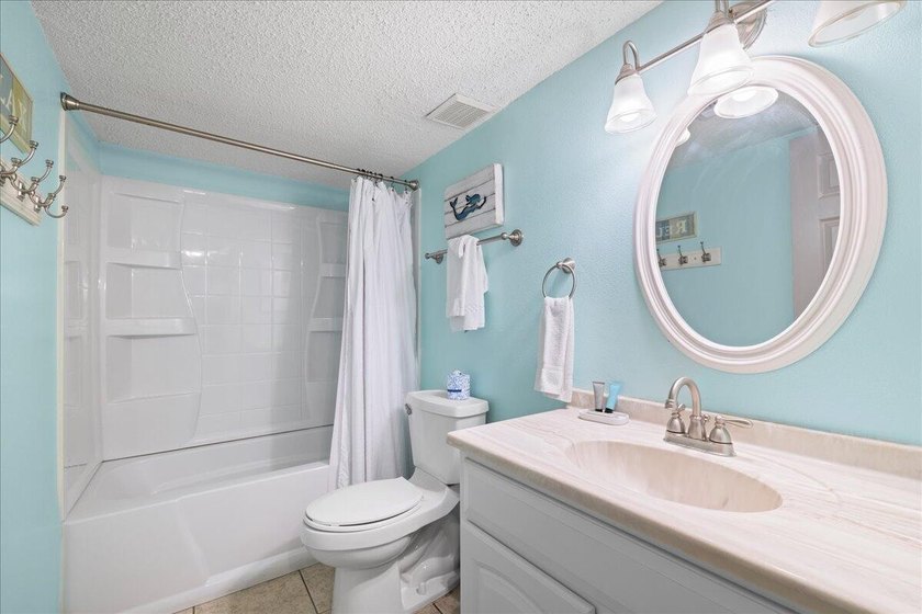 Welcome to this beautifully updated ground-floor condo in the - photo 18