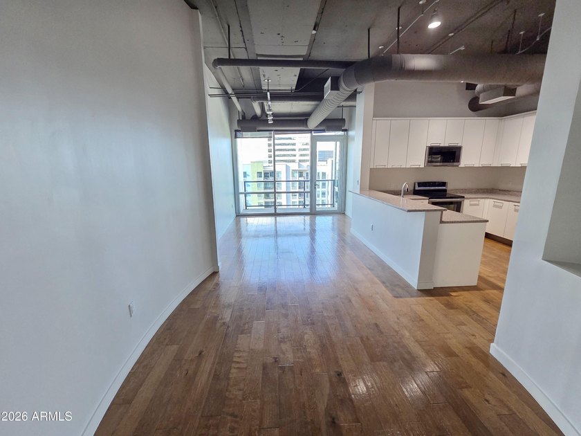 This seventh floor high-rise condominium showcases - photo 3