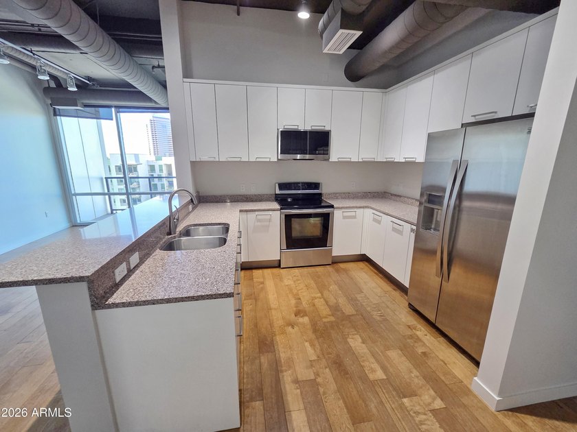 This seventh floor high-rise condominium showcases - photo 6