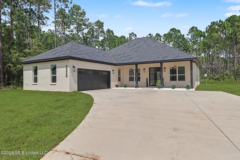 Welcome to this stunning custom-built 2025 home, where modern - photo 2