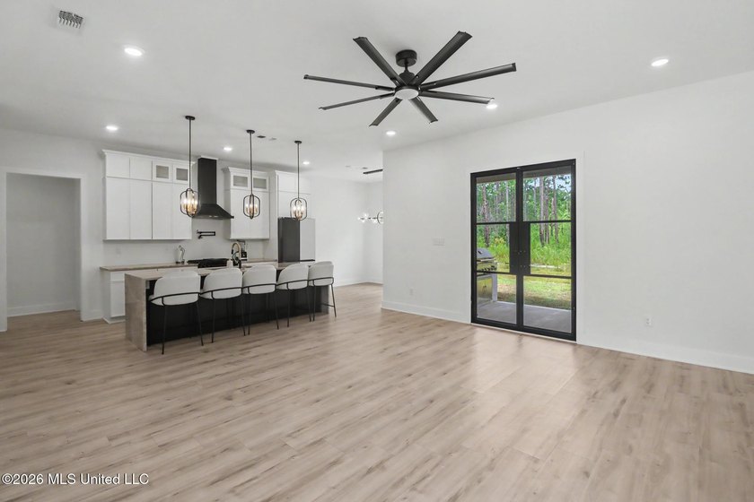 Welcome to this stunning custom-built 2025 home, where modern - photo 5