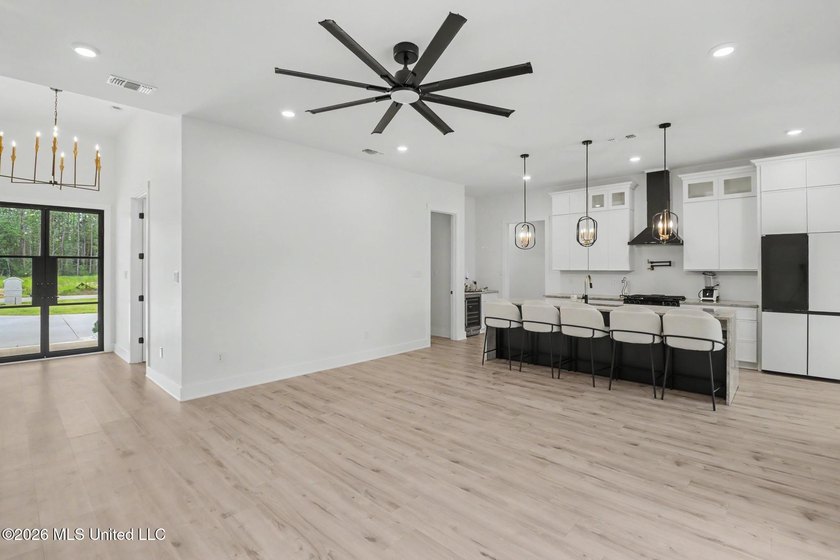 Welcome to this stunning custom-built 2025 home, where modern - photo 7