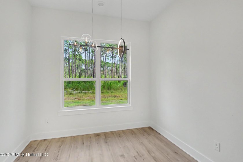 Welcome to this stunning custom-built 2025 home, where modern - photo 10