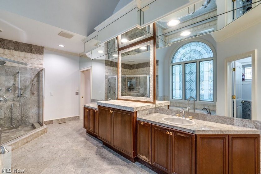 Step into an extraordinary two-story foyer where timeless - photo 23