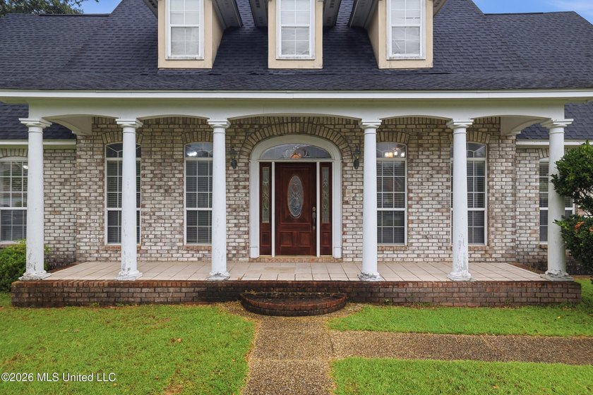 Welcome to this spacious 5-bedroom, 3.5 bath two story brick - photo 4