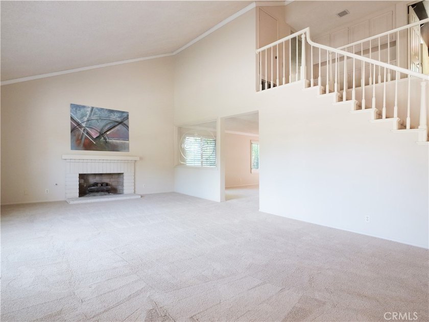 Situated on a quiet street overlooking a lush greenbelt in the - photo 5