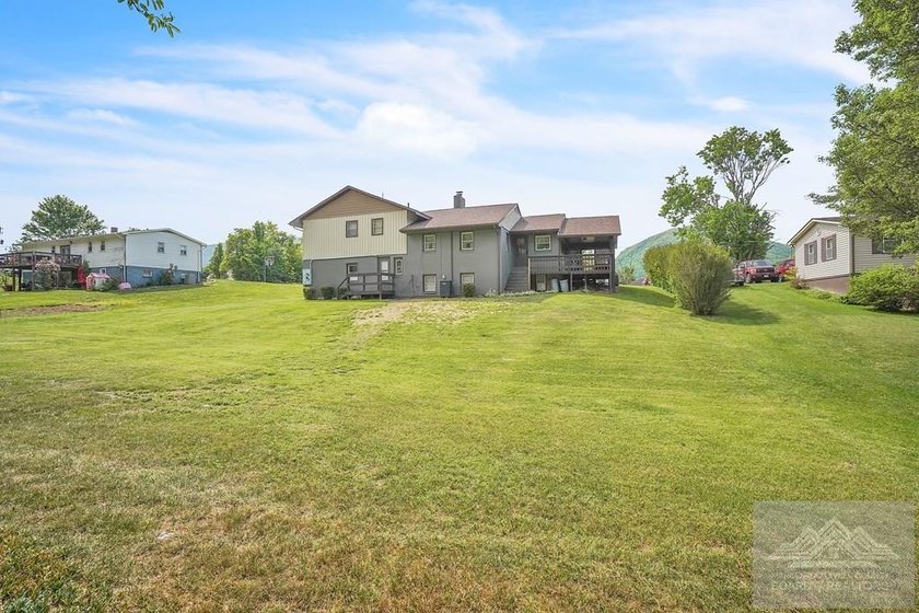 Beautifully renovated tri-level home offering space, comfort - photo 7