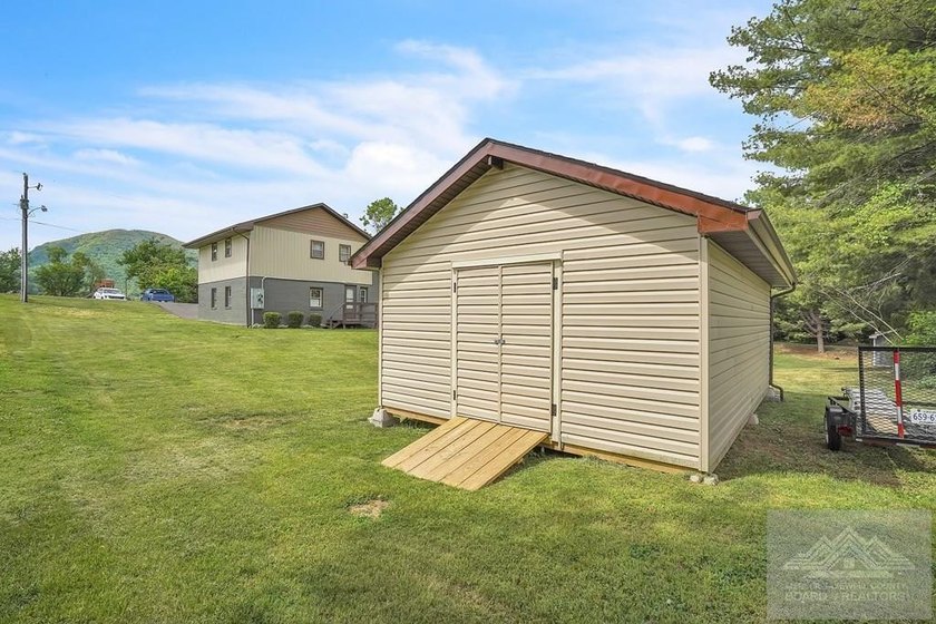 Beautifully renovated tri-level home offering space, comfort - photo 9
