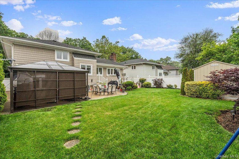 Fully renovated detached split-level home in the highly - photo 25