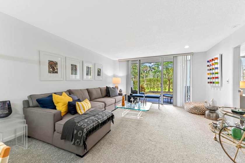Discover the ease of ground-floor living in this charming condo - photo 5