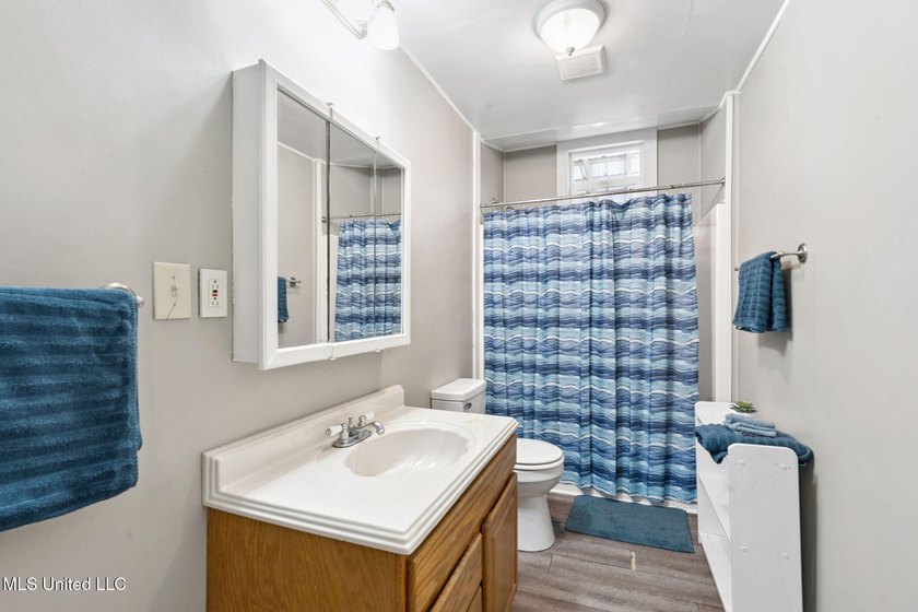 Classic elevated coastal cottages at 10450 MS 603 in Bay St - photo 24