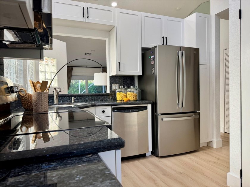 All ages Updated 2BR/2BA corner condo with the feel of a - photo 12