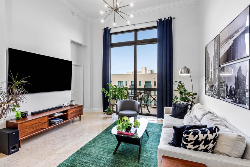 Fully upgraded 2 bed 2 bath plus a den! This stunning 5th-floor - photo 13