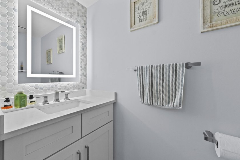 Welcome home to this beautifully remodeled 3-bedroom, 2.5-bath - photo 10