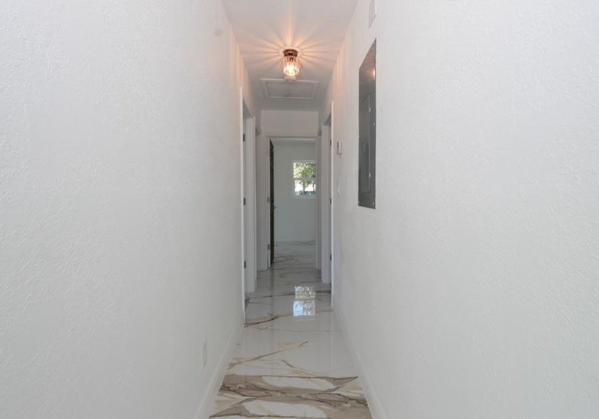 Step into a home where *renovated* is an understatement-it's - photo 11
