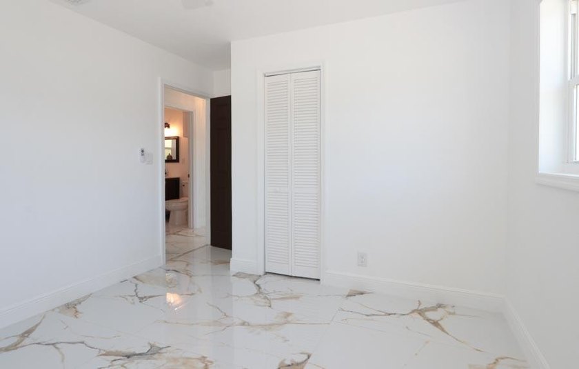 Step into a home where *renovated* is an understatement-it's - photo 12