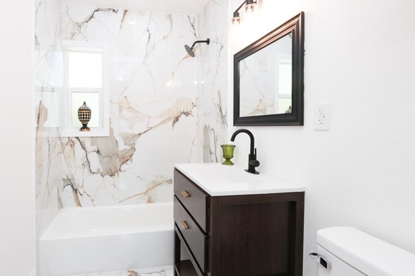 Step into a home where *renovated* is an understatement-it's - photo 14
