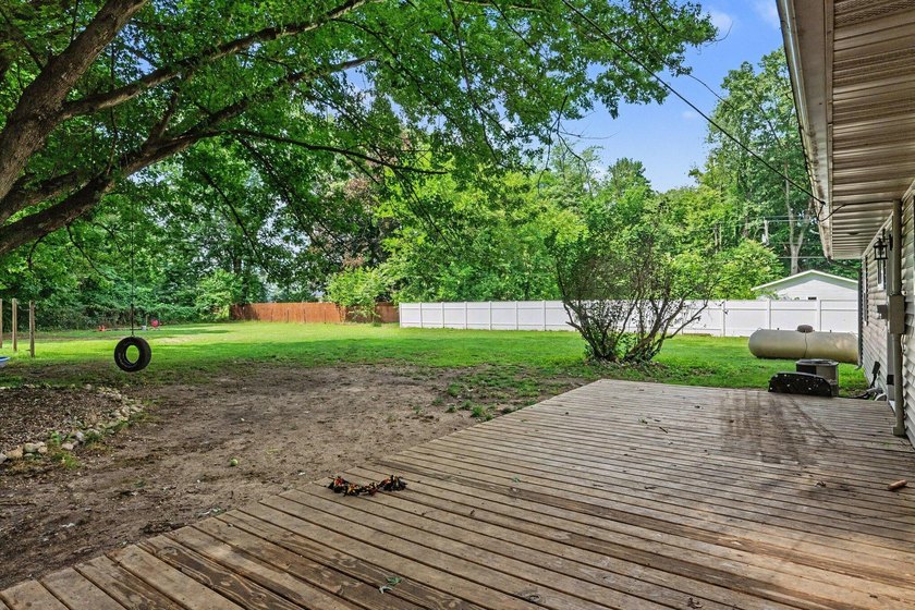 Nestled on 2 beautiful acres, this spacious ranch offers the - photo 21
