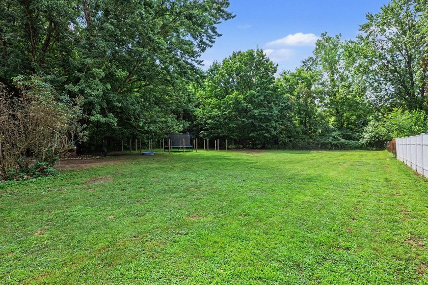 Nestled on 2 beautiful acres, this spacious ranch offers the - photo 22