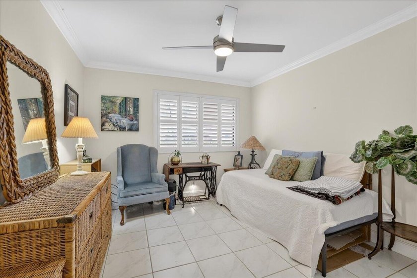 This spacious 2/2 ground-floor condo offers the perfect blend of - photo 13