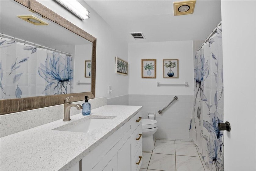This spacious 2/2 ground-floor condo offers the perfect blend of - photo 14