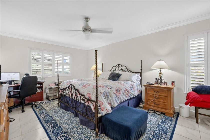 This spacious 2/2 ground-floor condo offers the perfect blend of - photo 16